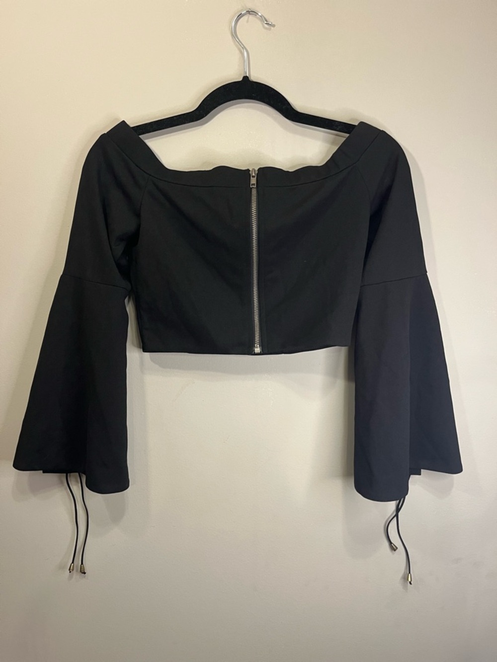 Black Off-Shoulder Crop Top with Bell Sleeves and Front Zip